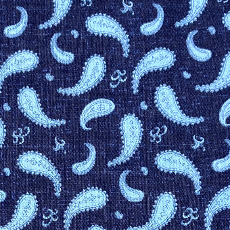 Light blue paisley and abstract designs on a deep blue background.