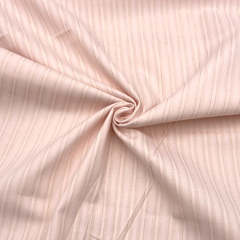 A light pink shirting fabric with subtle gold stripes. 